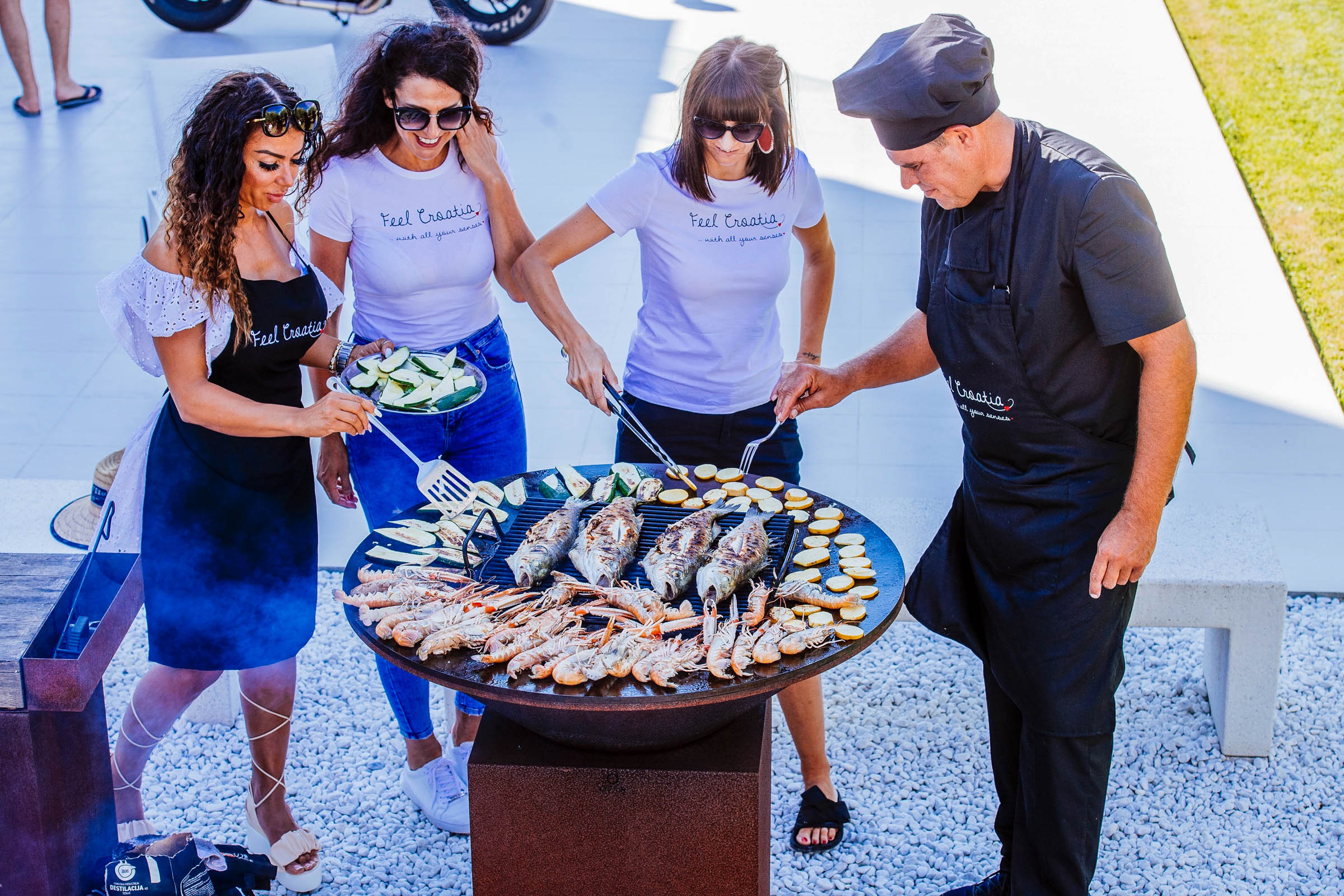 People grilling food